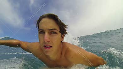 POV Surfer Riding Wave Slow Motion