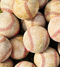 Pile up a stack of old baseball in green