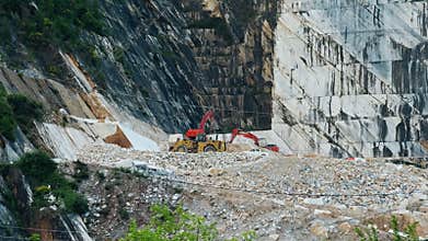 mechanical means working on the extraction of white Carrara marble
