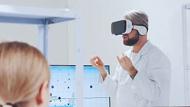 Scientific laboratory filled with various research equipment. Scientists are conducting experiments and research