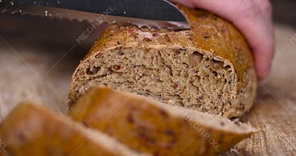 a healthy loaf of soft bread with added seeds and bran
