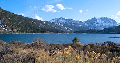 Scenic June lake landscape of snow capped Eastern Sierra mountains, California