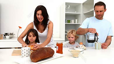 Family enjoying breakfast together