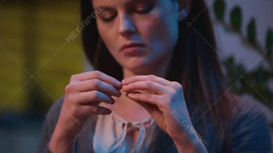 Sad woman take off wedding ring upset Caucasian girl regret thinking marriage mistake breakup divorce pensive frustrated