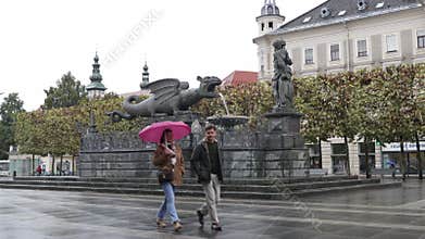 The Lindworm Fountain (Lindwurmbrunnen) on a cloudy day in Neuer Platz, Klagenfurt, Austria