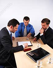Business men reading a contract
