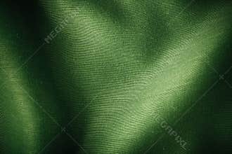 Green background abstract cloth wavy folds of textile texture