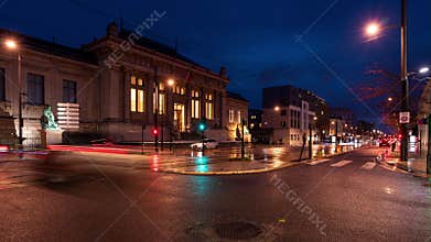 Trams and cars passing Palais de Justice in Le Havre