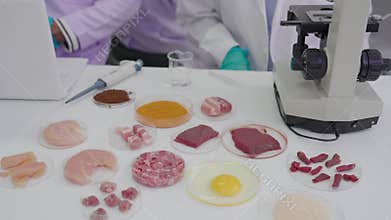 Laboratory quality control testing by food scientists and microbiologists involves analyzing vegetable samples