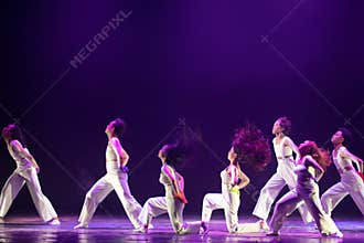 Expressive Contemporary Dancers With Dramatic Hair Motion on Stage