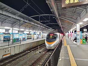 Two trains waiting at Takamatsu station