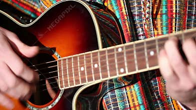 Mexican plays guitar Close-up plan, Playing guitar