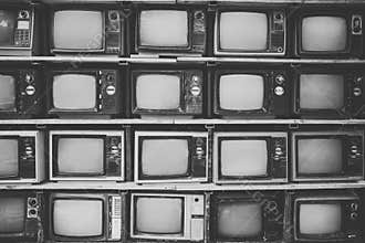 Pattern wall of pile black and white retro television TV