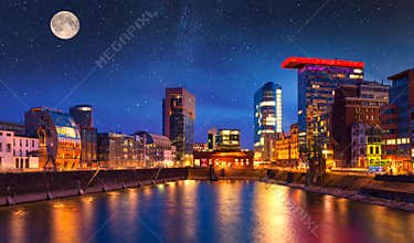Colorful night scene of Rhein river at night in Dusseldorf