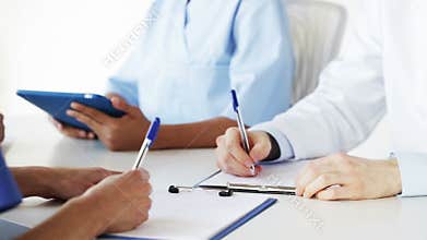 Group of doctors at meeting in hospital