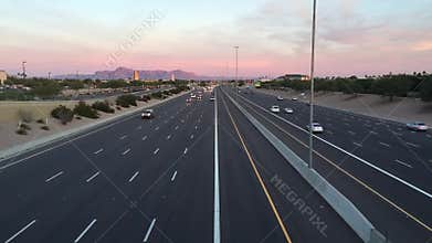 Highway traffic at sunset to night, Arizona,USA