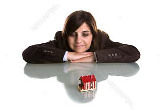 Young woman dreaming with new house
