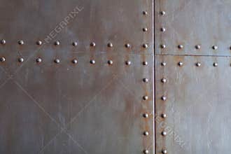 Metal texture with rivets