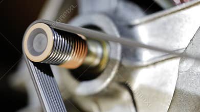 Metal shaft as it turns.