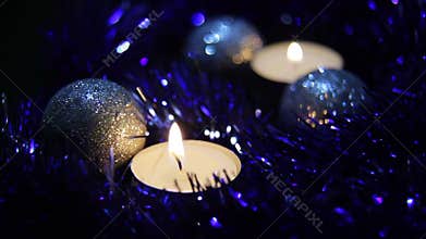Christmas New Year candle Blue sparkling Background