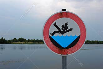 Danger sign DO NOT FALL INTO THE DAM WATER