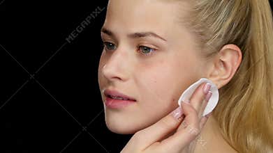 Cleaning skin. Black. Closeup