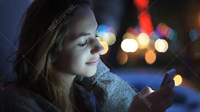 Young girl chatting on cell telephone.