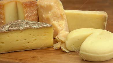 French of cheese on a wooden table.