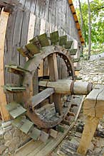 Water mill. Traditional wooden paddle wheel - Romania