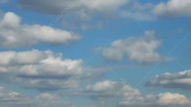 Forming puffy clouds dramatic sky fast motion picturesque day time-lapse