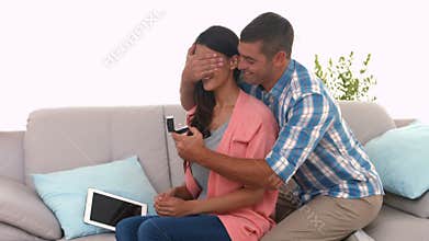 Man surprising his girlfriend with a proposal