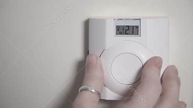 Central heating thermostat