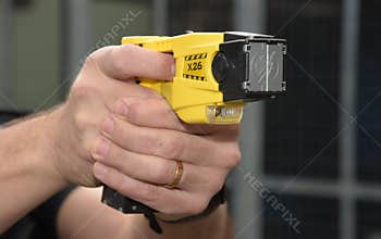 Police Taser gun on aim