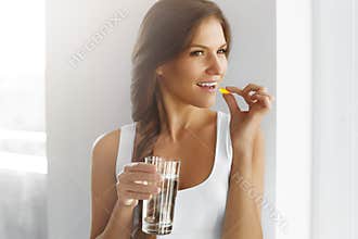 Healthy Diet. Nutrition. Vitamins. Healthy Eating, Lifestyle. Woman With Fish Oil Capsules.