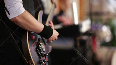 Guitarist playing an electric guitar