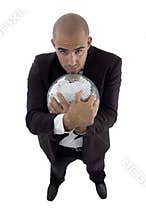 Handsome young attorney hugging disco ball
