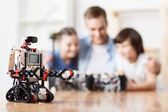 Modern robot standing on the table