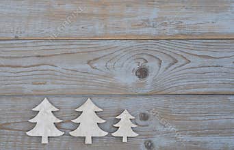 White christmas decoration christmas tree on a old grey wooden background with empty copy spac