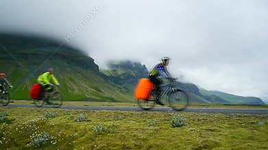 Cyclists travel the roads of Iceland