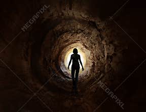 Walk into the light in the dark tunnel