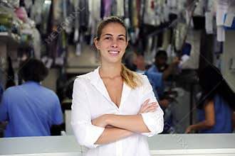 Happy owner of a dry cleaning business