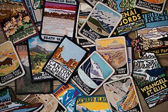 Flatlay arrangement of various USA United States National Parks and monuments patches from gift