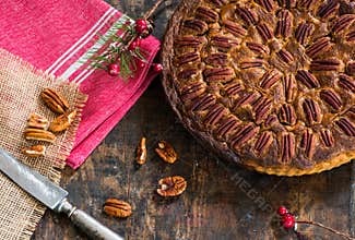 Pecan pie on rustic wooden table