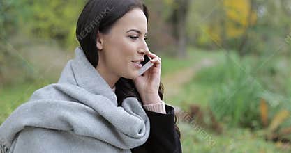 Attractive woman speaking on phone