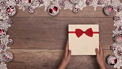 Hand opening christmas present box
