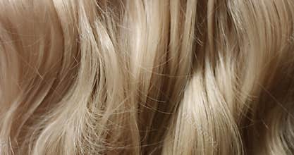 Close up video or woman`s blond hair