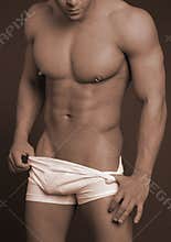Fit body with piercing sepia