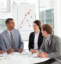 Manager and his team discussing a new strategy