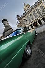Green car perspective in havana, cuba