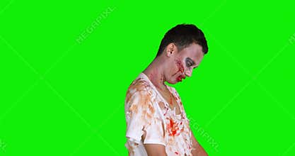 Creepy zombie man looking at camera